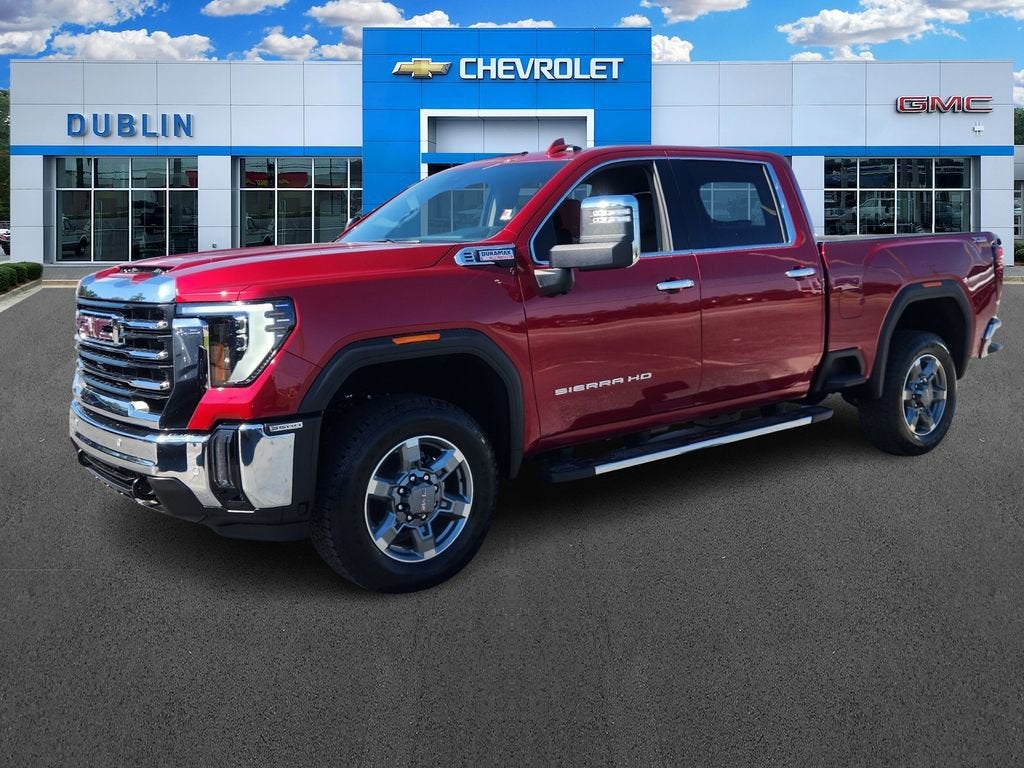 2026 GMC Sierra 3500 HD SLT in Volcanic Red Tintcoat — front three-quarter view