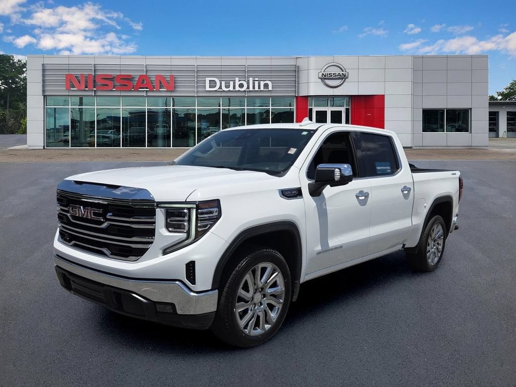 2026 GMC Sierra 1500 SLT in Summit White — front three-quarter view