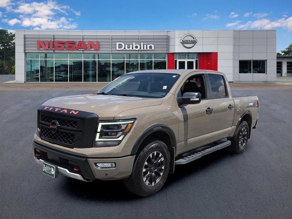 2022 Nissan TITAN Crew Cab PRO-4X 4x4 in Beige — front three-quarter view